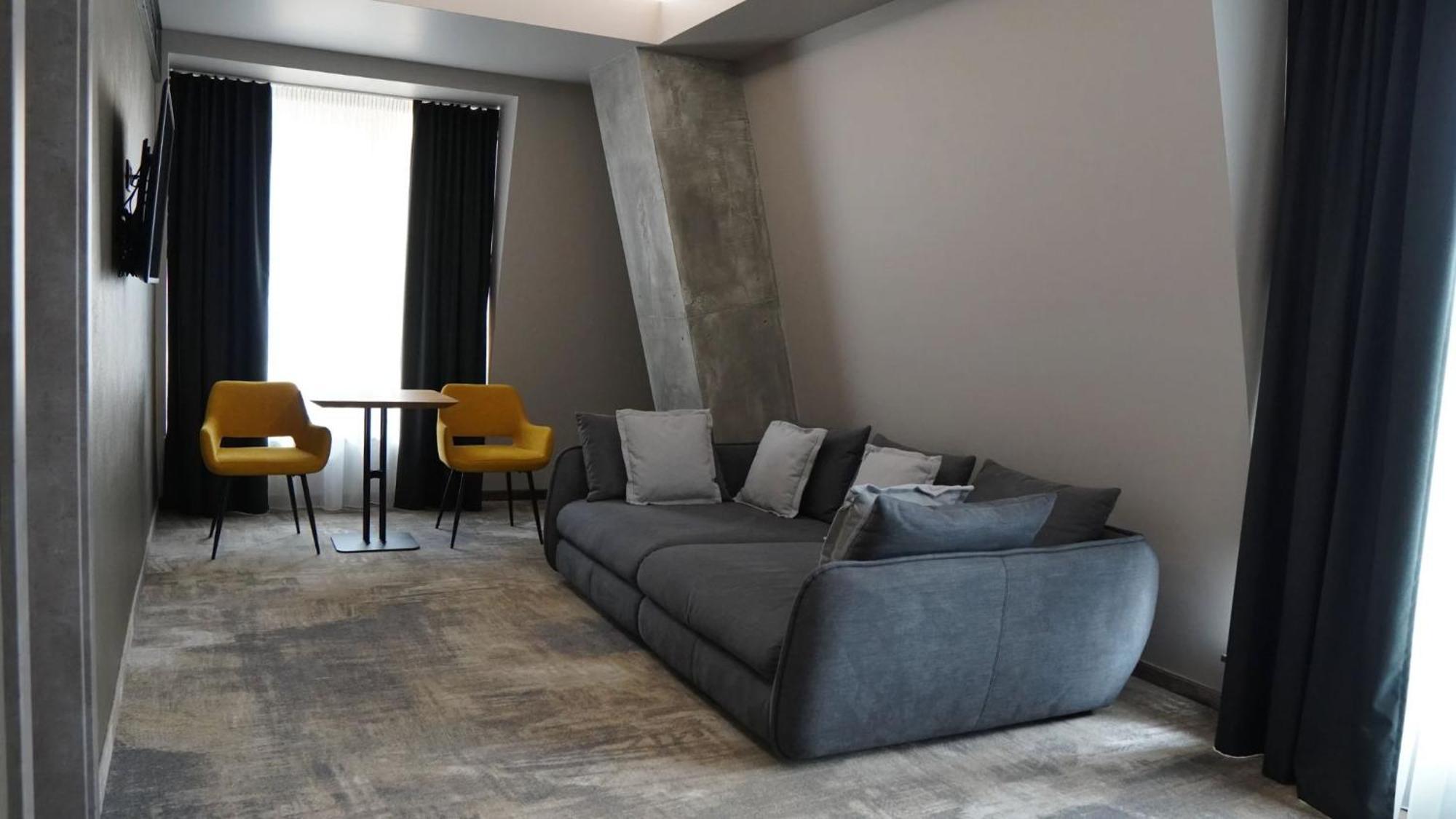 Aniroc Signature Hotel Arad Exterior photo A 3D rendering of a living room